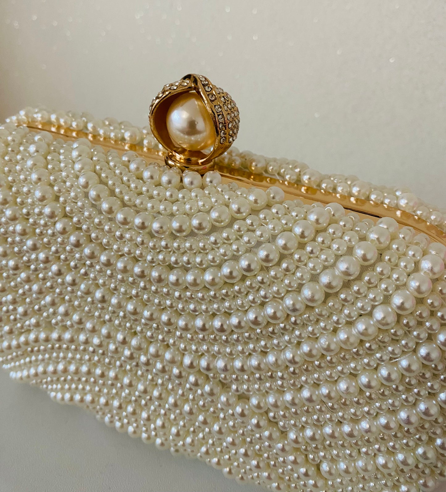 Celeste Ivory Pearl Clutch